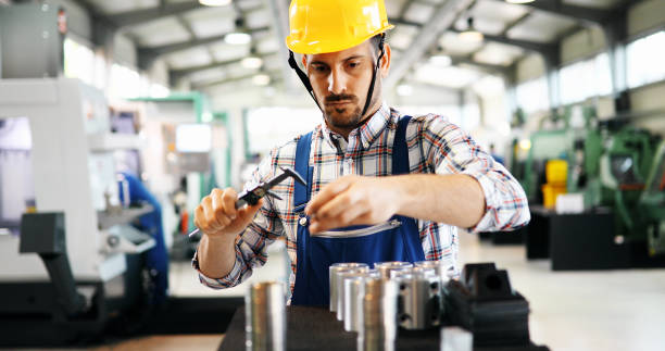istock Male worker and quality control inspection in factory 882322452