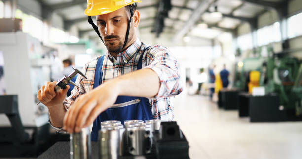 istock Male worker and quality control inspection in factory 882322584
