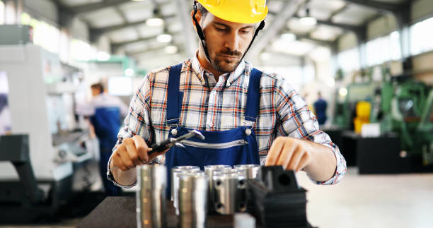 istock Male worker and quality control inspection in factory 882322668