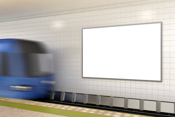 istock Blank wall for advertising poster on subway station with train 882323426