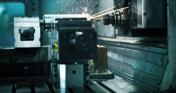 istock machine tool in metal factory with drilling cnc machines 882326604