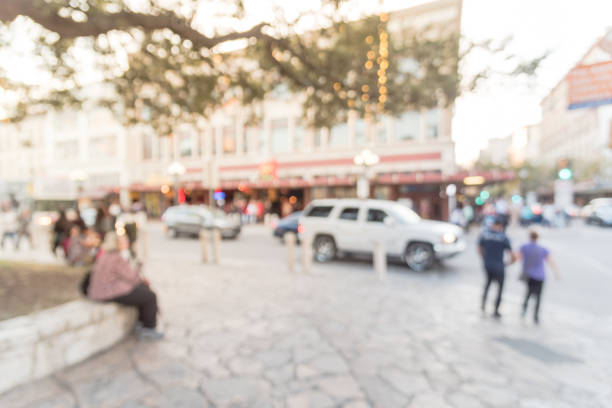 istock Blurred people walking at Alamo Square in Downtown San Antonio 882334576