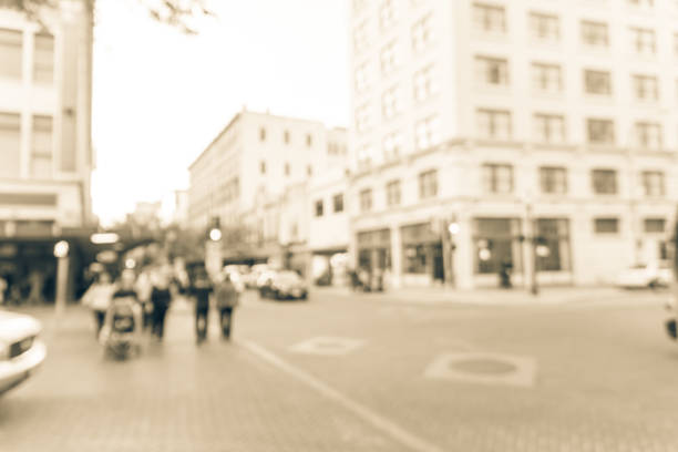 istock Blurred people walking at Alamo Square in Downtown San Antonio 882334852