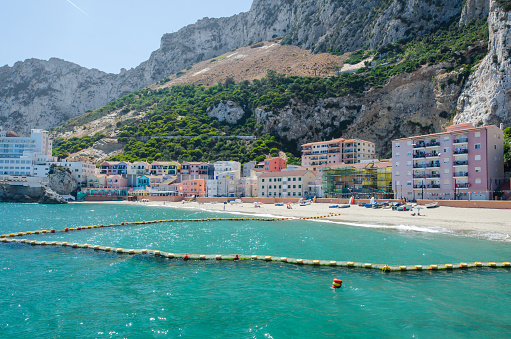 View of small fishing village and sandy beach at Catalan Bay (La Caleta). British Overseas Territory of Gibraltar.