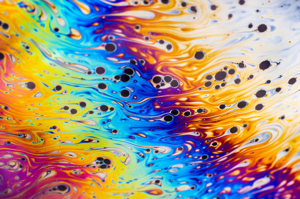 istock Beautiful psychedelic abstraction formed by light on the surface of a soap bubble 882337472