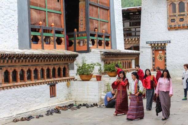 Bhutanese people in Chimi Lhakhang (Monastery of Fertility) in Bhutan stock photo
