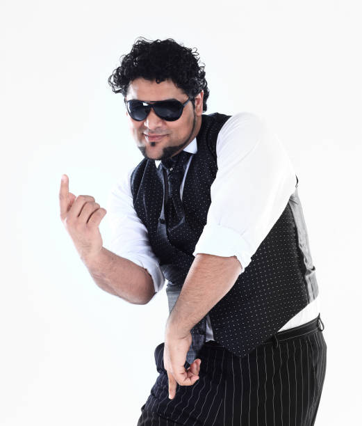 istock stylish DJ in sunglasses takes break dance 882346840