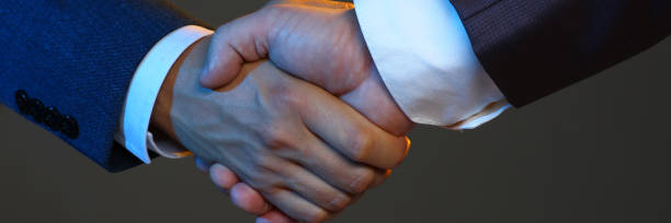 istock Man in suit shake hand as hello in office 882351104