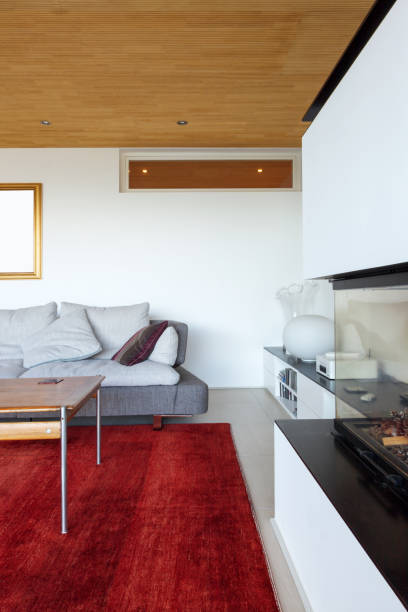 istock Modern living room with fireplace 882354032