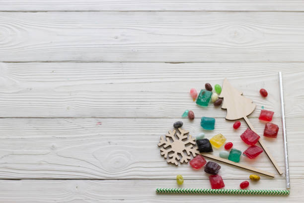 istock Christmas light wooden background 882358752