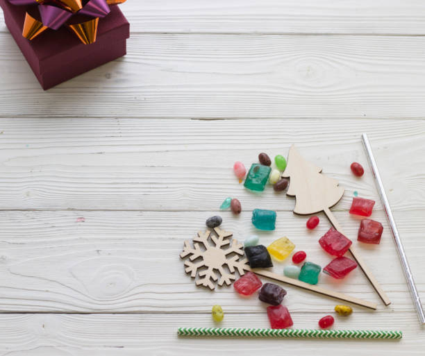 istock Christmas light wooden background 882358866