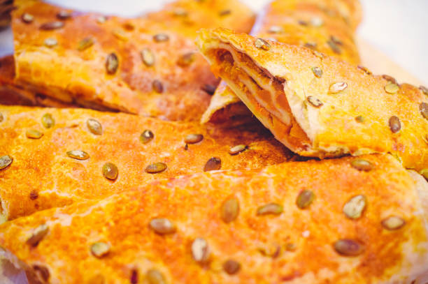 istock baking golden pies with jam and seeds, dessert for dinner, home cooking 882358872