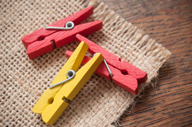 istock wooden clothes pin on wooden table background 882367754