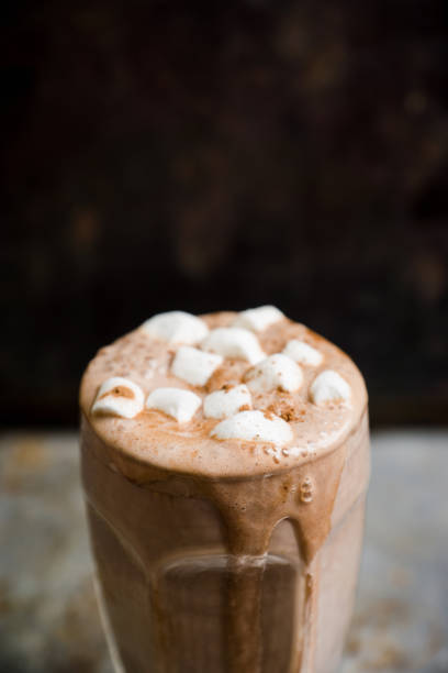 istock Hot chocolate with marshmallow on the wooden background 882368416