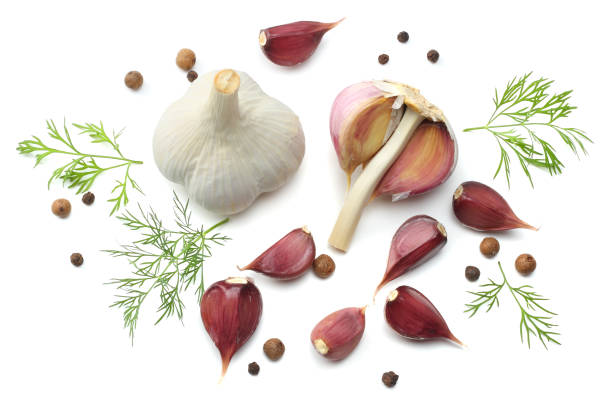 istock garlic and spices isolated on white background. top view 882372908