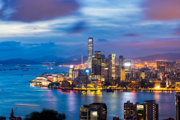istock Hong Kong City skyline at sunset 882373676