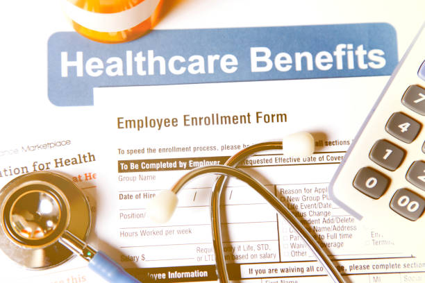 istock Open enrollment healthcare benefit forms. 882378434