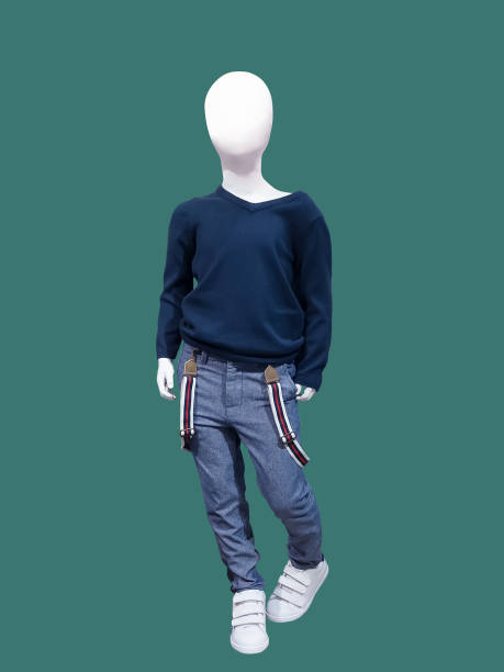 istock Child mannequin dressed sweater and trousers. 882383864