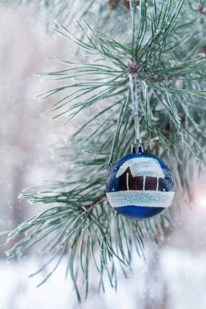 istock silver ball weighs on the pine branch 882383982