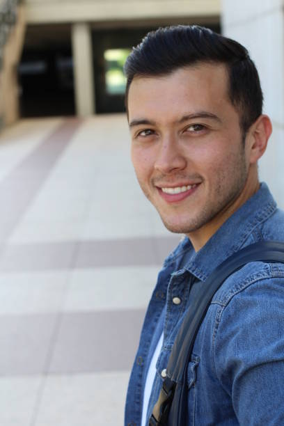istock Cute mixed race person male smiling isolated 882385178