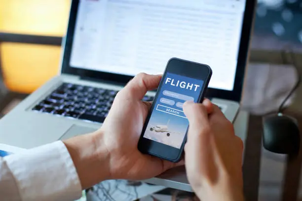 search flights on mobile application online, booking of plane tickets, travel planning concept