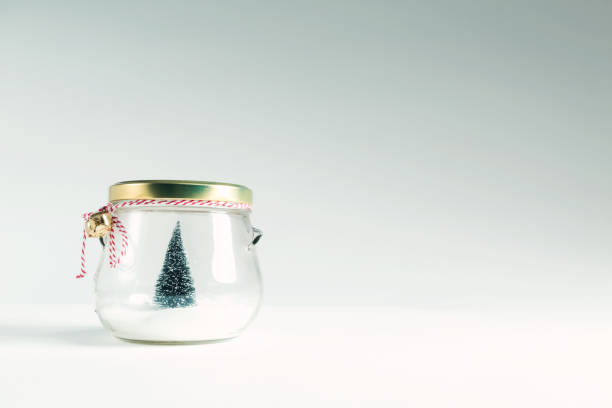 istock Christmas tree in a glass jar 882405650