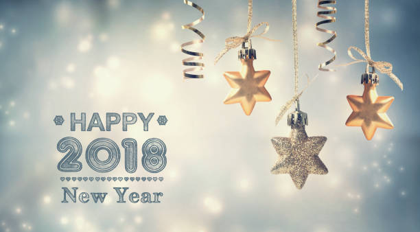 istock Happy New Year 2018 message with hanging stars 882405894