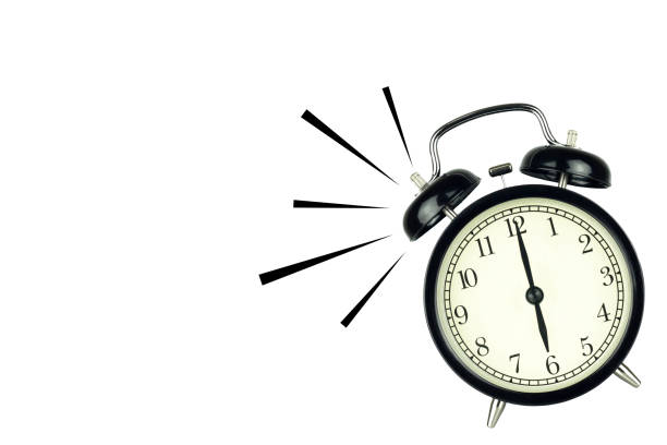 Alarm Clock wake-up time isolated on white background, showing six o'clock.