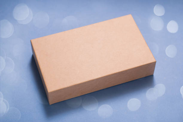 istock Christmas package, Vintage gift box on a blue background, 882411974