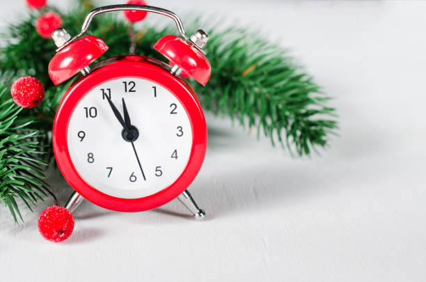 istock New Year's clock. Christmas greeting card. 882415270