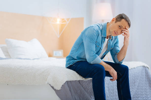 istock Attractive young male turning head on camera 882415622