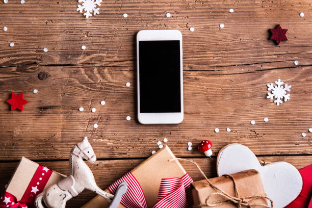 Christmas composition on a wooden background.