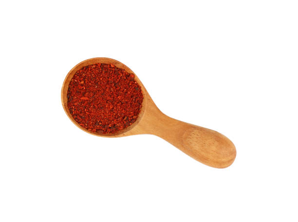 istock Close up wooden spoon of sundried tomatoes 882425170