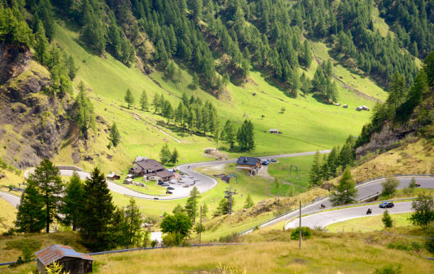 istock Winding road on mountain, European Alps 882435986