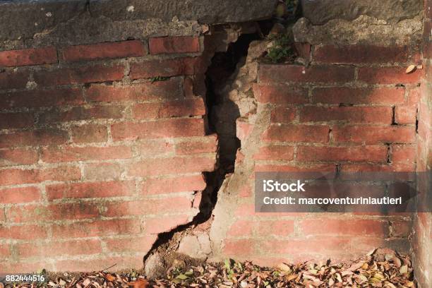Cracked Brickwall Stock Photo - Download Image Now - Collapsing, Surrounding Wall, Wall - Building Feature