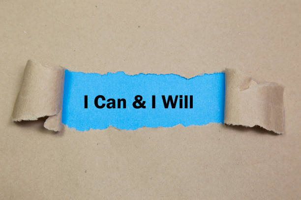 istock I Can And I Will message written under torn paper. 882458138