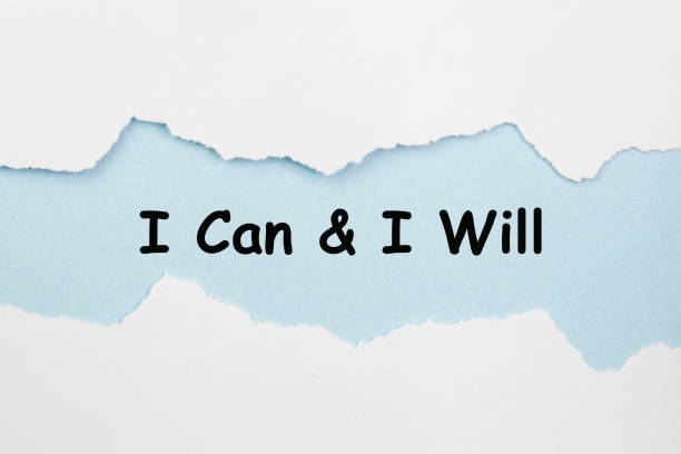 istock I Can And I Will message written under torn paper. 882458158