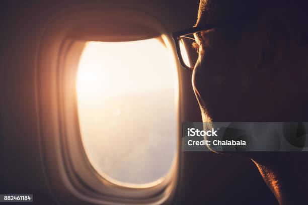 Traveling By Airplane Stock Photo - Download Image Now - Airplane, Window, Business Travel