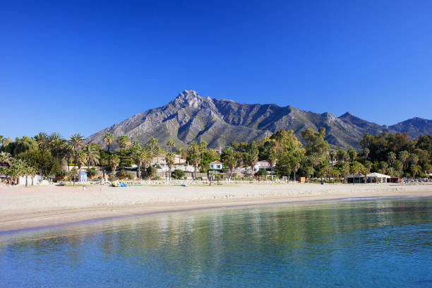 Marbella Beach on Costa del Sol in Spain Marbella sandy beach, summer holiday scenery by the Mediterranean Sea in Spain, Andalusia region, Costa del Sol, Malaga province. costa del sol málaga province photos stock pictures, royalty-free photos & images