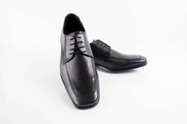 istock Male black leather elegant shoe on white background 882477702