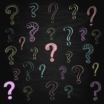 Hand drawn question marks on blackboard. Vector.