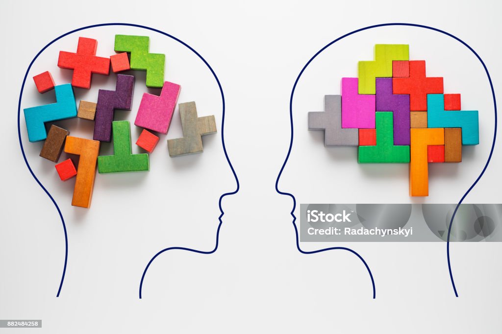Heads of two people with colourful shapes of abstract brain The concept of rational and irrational thinking of two people. Heads of two people with colourful shapes of abstract brain for concept of idea and teamwork. Two people with different thinking. Contemplation Stock Photo