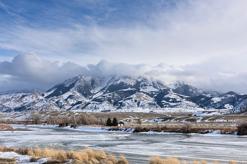 Winter scenic of Montana with snow covered mountains.