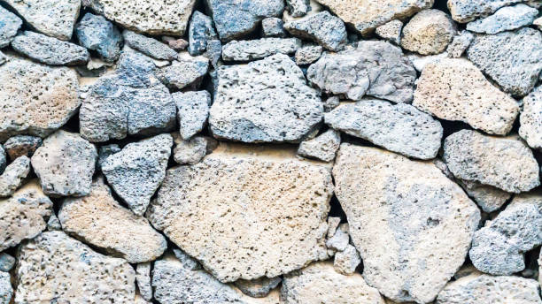 istock wall of lava rocks 882493968