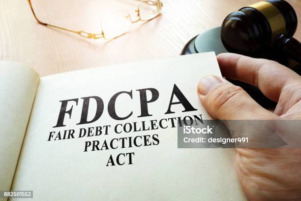 Photo libre de droit de Juste Dette Collection Pratiques Loi Fdcpa Sur Une Table banque d'images et plus d'images libres de droit de Collection