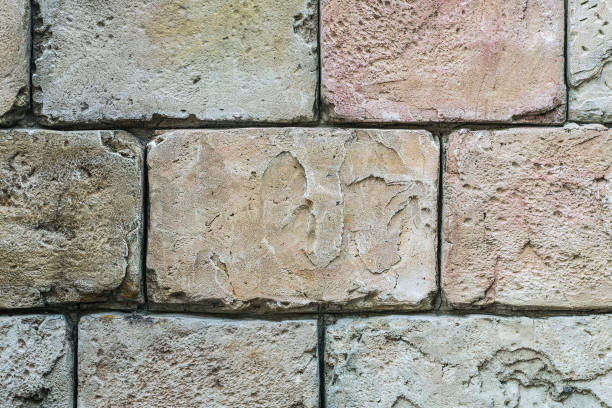 istock Texture of an aged brick wall beige 882501714