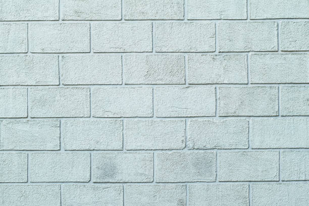 istock Plastered textured wall in form of brick blocks 882501992
