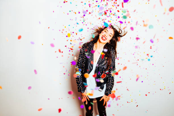 istock Happy party woman with confetti 882512602