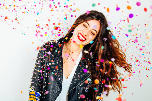Happy party woman with confetti