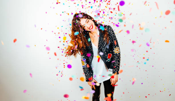 istock Happy party woman with confetti 882512688